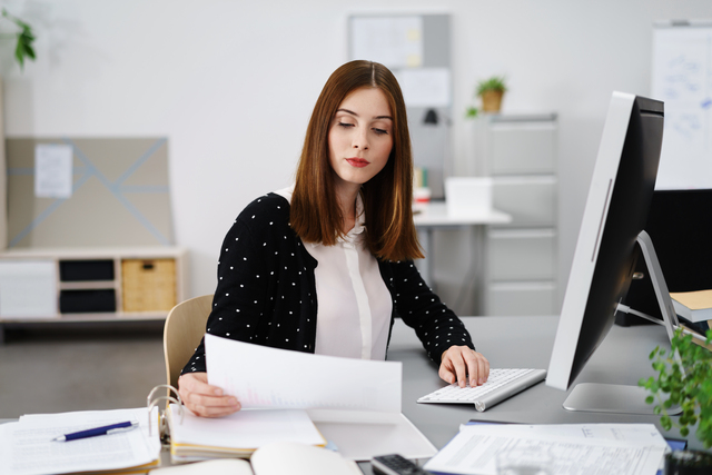 businesswoman checking documents